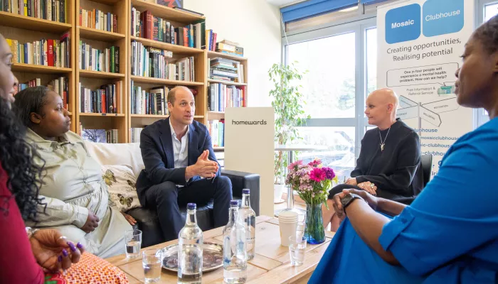 HRH Prince William, indoors, talking to some young people in Lambeth 