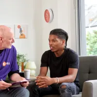 A young person talks to Centrepoint staff