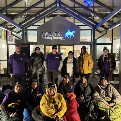 Coventry Building Society wrapped up warm outside their office for Sleep Out
