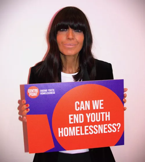 Claudia Winkleman shows her support for Centrepoint and holds a banner with the words "Can we end youth homelessness?"