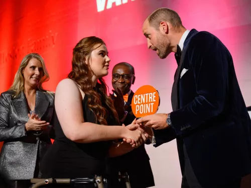 young person receiving a Centrepoint Award from Prince William