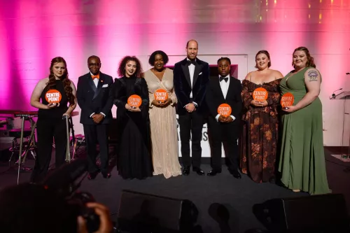 Our Centrepoint Awards winners stand on stage with HRH Prince of Wales and CEO Sey Obakin