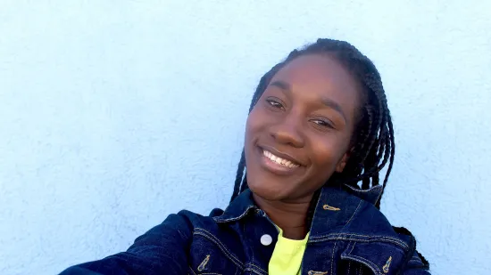 Young person smiling in a selfie