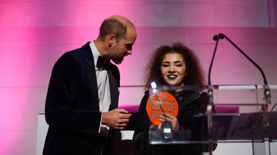 Cassie, accepting her award