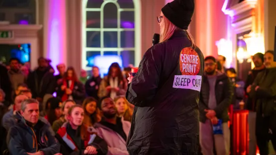 Sleep Out audience listening to speaker on stage