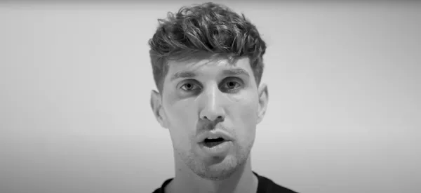 Black and white screenshot of footballer John Stones