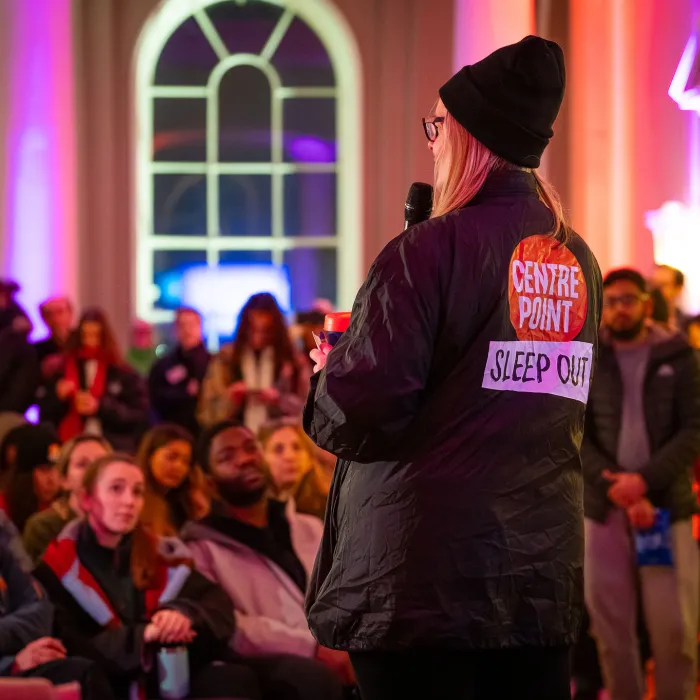 Sleep Out audience listening to speaker on stage