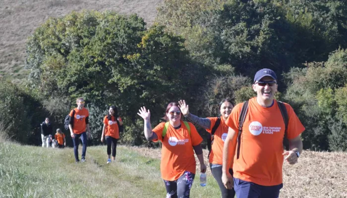 Walkers in a field wearing Centrepoint T-shirts
