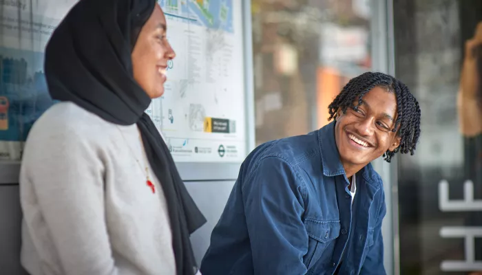 Young people at bus stop