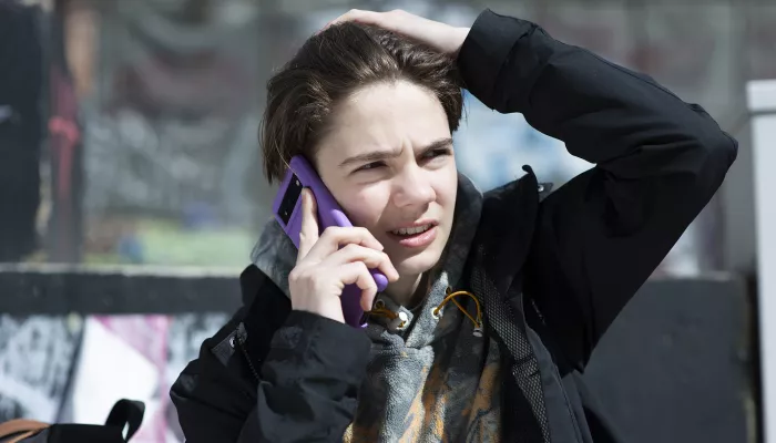Young person on a mobile phone