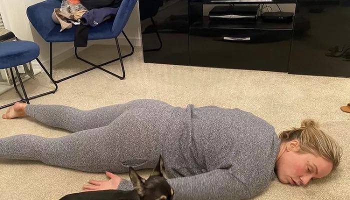 Vicky Pattison stretches out on the floor of her living room after a long all-nighter for Centrepoint