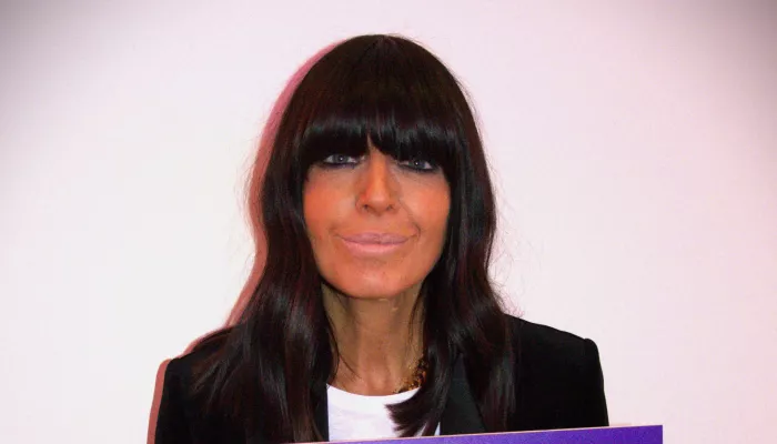 Claudia Winkleman shows her support for Centrepoint and holds a banner with the words "Can we end youth homelessness?"