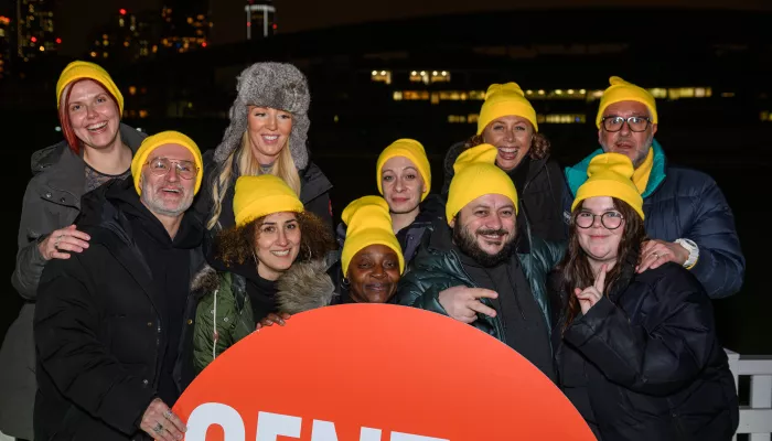 Selfridges staff take part in Sleep Out for Centrepoint wearing matching yellow beanie hats