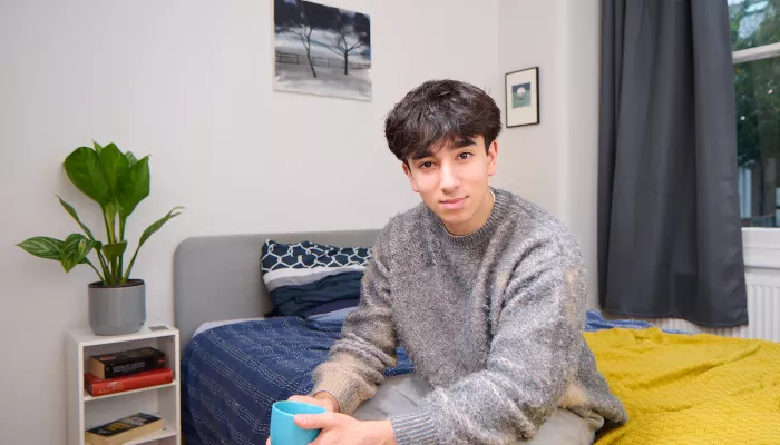 Carim sat on his bed in Centrepoint service