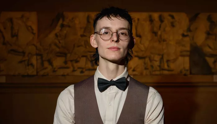 Young person wearing bow tie and waistcoat