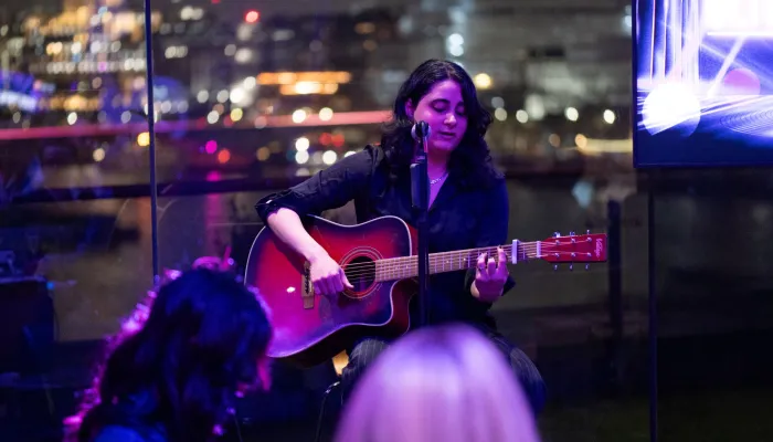 Rana performs for guests at the OXO Tower for the Ultimate Quiz 2025