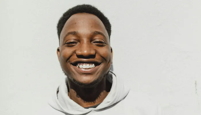 Young man smiling at camera