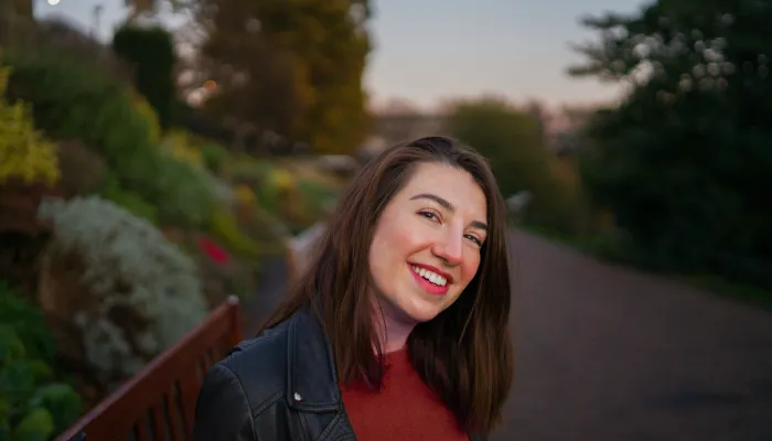 Young woman outside smiling