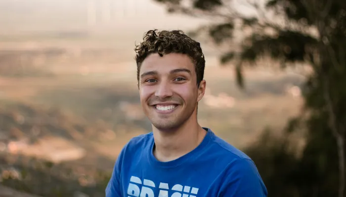 Young man smiling at the camera