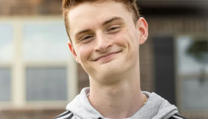 Young man smiling at camera