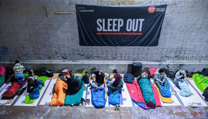 Sleep Out participants get into their sleeping bags