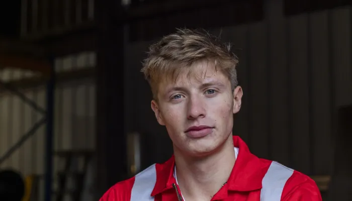 Young man working in construction looks frustrated