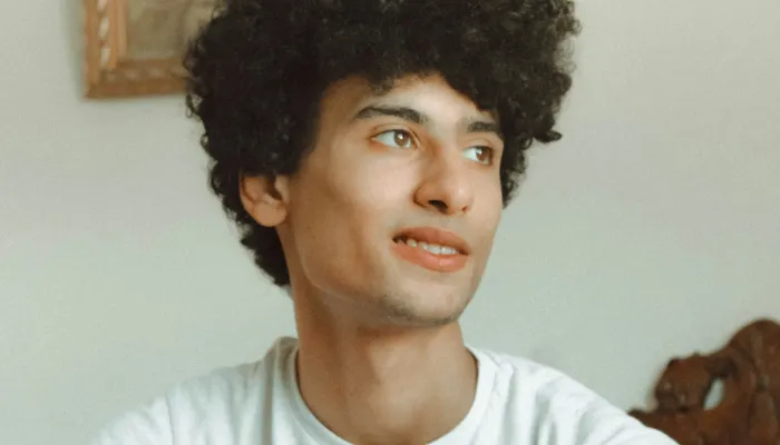 Young man looking away from camera