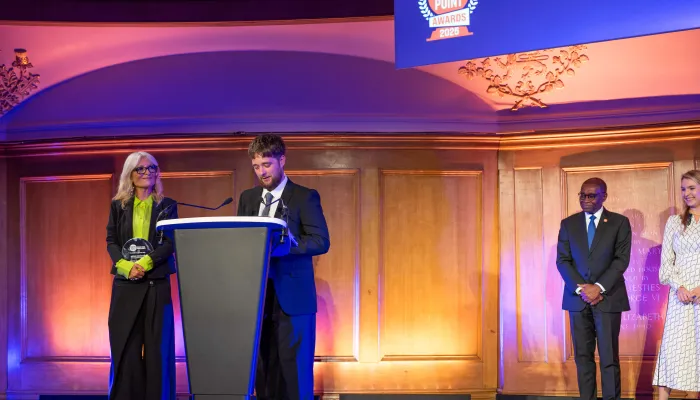 Gaby Roslin and young person winning an award