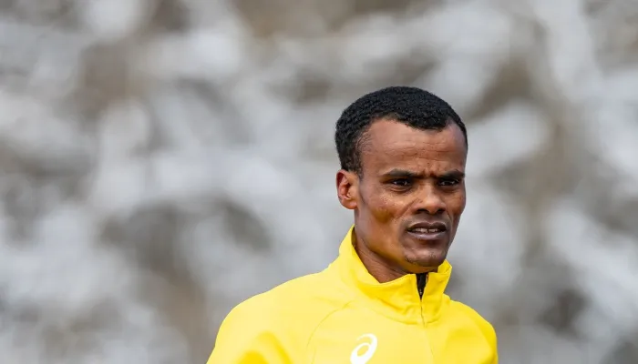 Young man outside running