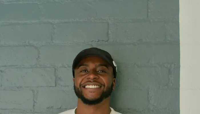 Young man smiling at camera