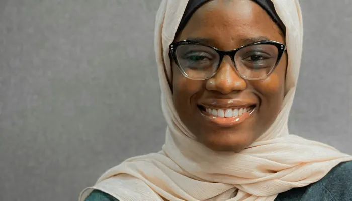Young woman in a headscarf smiling
