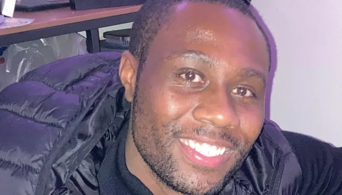 Young man smiling at camera