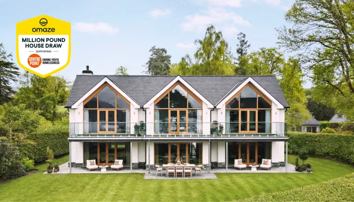 Omaze house with Omaze and Centrepoint logo