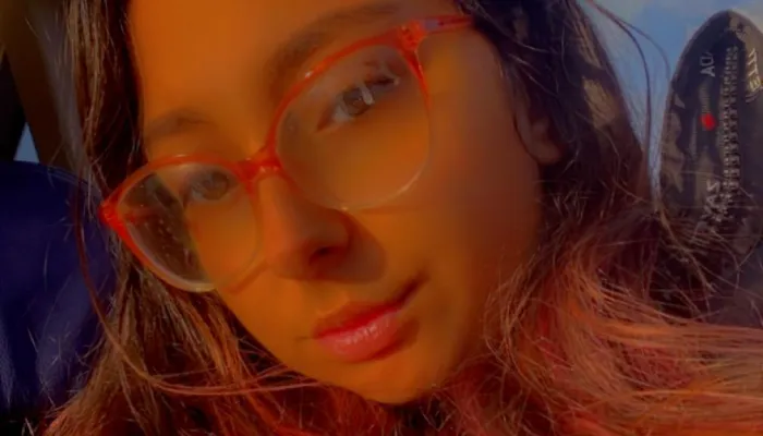 Young woman in glasses