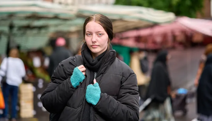 Young person walking in the street 