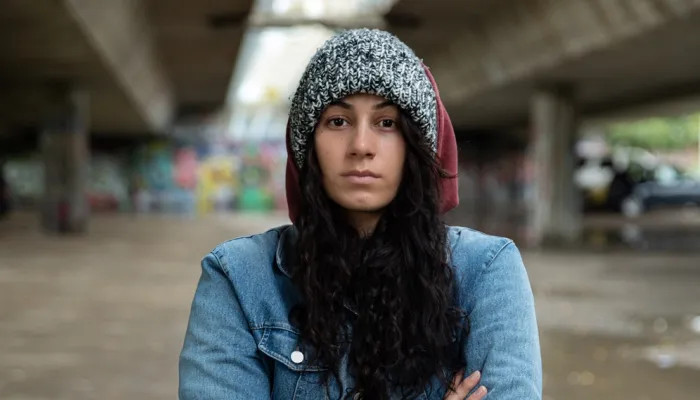 Stephania - young person standing outside in underpass
