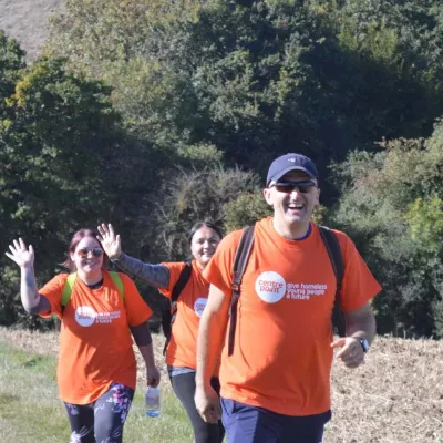 Walkers in a field wearing Centrepoint T-shirts