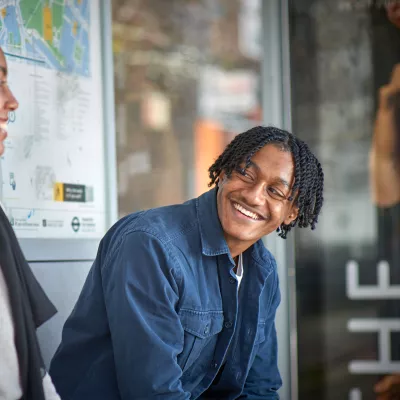 Young people at bus stop