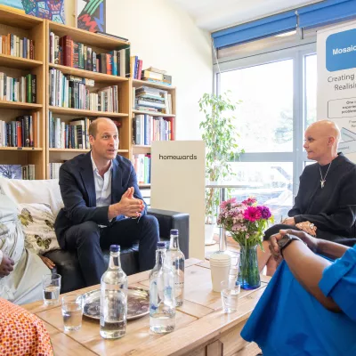 HRH Prince William, indoors, talking to some young people in Lambeth 