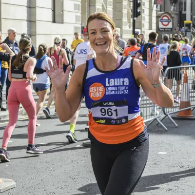 Runner waving