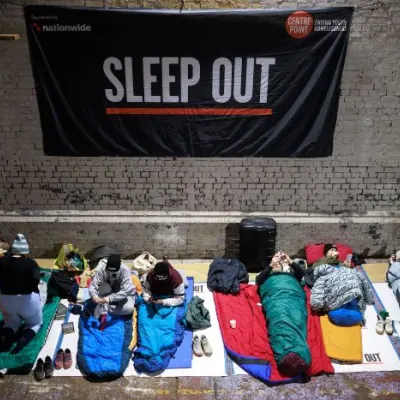 Sleep Out supporters bed down for the night in their sleeping bags