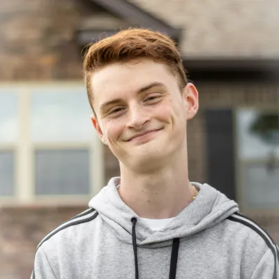 Young man smiling at camera