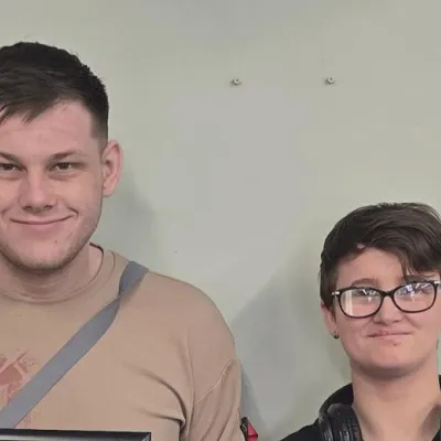 Young people smiling and looking at the camera