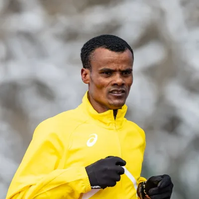Young man outside running