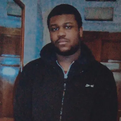 Young man wearing a black hoodie