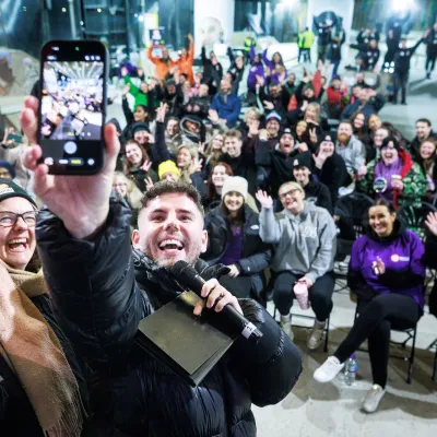 Dean McCullough takes a selfie with loads of happy Sleep Out participants in Manchester