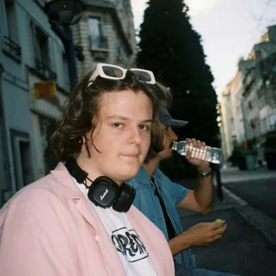 Young person in a pink shirt